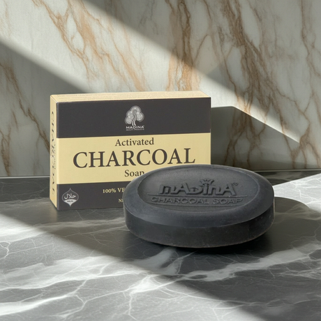 Madina Activated Charcoal natural soap bar for daily cleansing, bathing, and skincare.