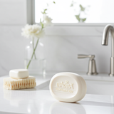 Madina goat milk soap bar displayed for daily washing and refreshing skin care.