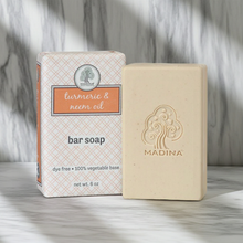 Madina Turmaric & Neem Spice cleansing bar soap for washing the skin, bathing, and everyday care.