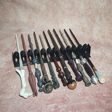 Magic wand display rack stand for presenting, storing, and organizing up to 11 collectible wands.