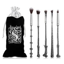 Magic wand makeup brush kit inspired by Harry Potter with beauty brushes for powder, contour, and eyeshadow application.