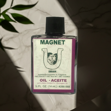 Magnet Wish Oil bottle for spiritual drawing, prosperity work, and attraction rituals.