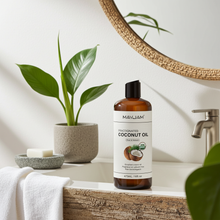 MAYJAM 473ml Cold-Pressed Fractionated Coconut Oil product bottle for daily moisturizing and body care.