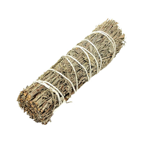 Meditation smudge stick with frankincense, myrrh, and white copal resin for spiritual cleansing rituals.