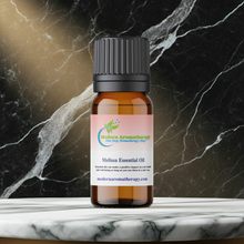 Melissa Essential Oil bottle for massage oil blending, topical dilution, and soothing emotional support self-care use.