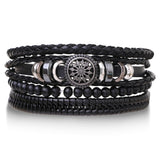 Men’s rustic leather tribal charm bracelet stack with braided cords and metal accents for layered wear, street fashion, and daily outfits.