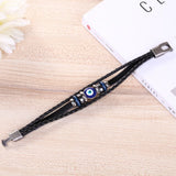 Men’s vintage Turkish evil eye braided leather bracelet for daily accessorizing, symbolic protection, and relaxed outfit styling.