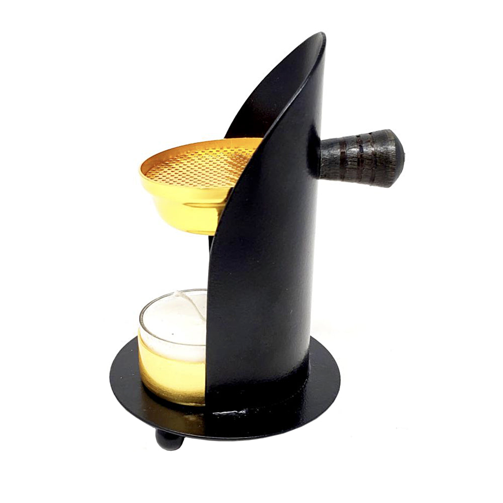 Metal adjustable resin burner close-up detail of brass finish for altar and meditation space decor.