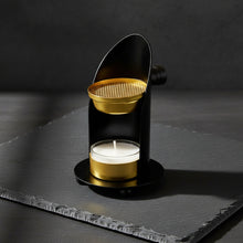 Metal adjustable resin burner close-up detail of brass finish for altar and meditation space decor.
