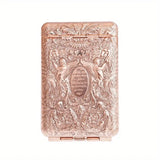 Retro floral carved metal cigarette case for protecting cigarettes and adding a decorative touch to daily carry.
