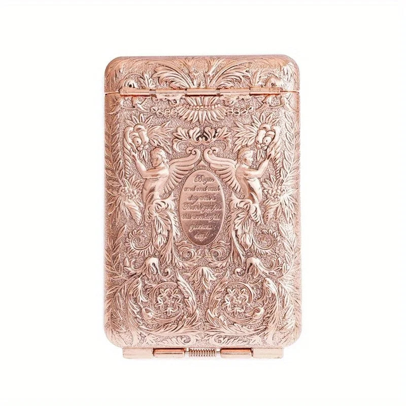 Retro floral carved metal cigarette case for protecting cigarettes and adding a decorative touch to daily carry.
