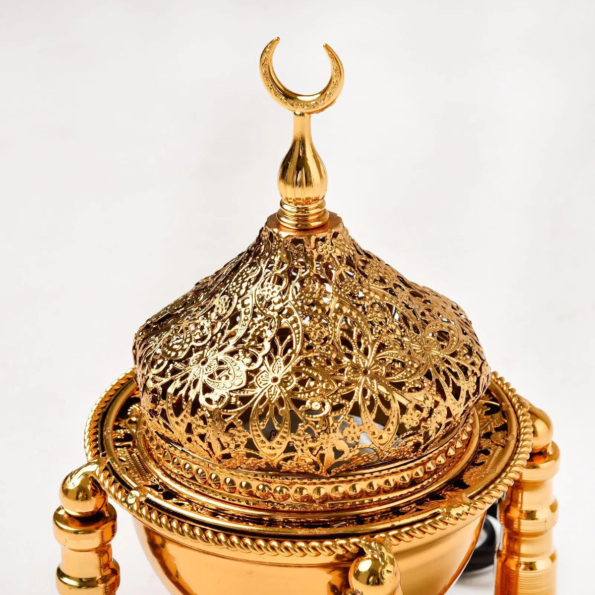 Metal electric bakhoor burner for warming oud and bakhoor for daily fragrance and ceremonial use.