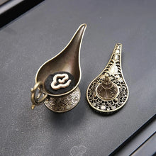 Metal incense burner and candle holder for home decor, incense use, and creating a calming atmosphere.