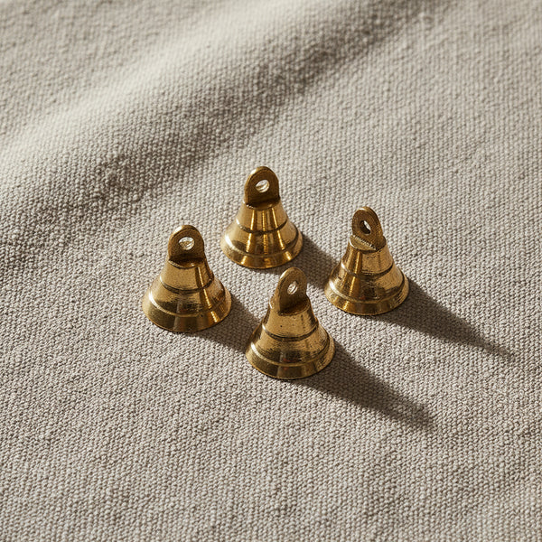 Mini brass bell 1 inch for ritual bell ringing, altar use, and energy clearing ceremonies.