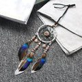 Mini Car Dream Catcher with natural feathers hanging ornament for car mirror decor, spiritual protection, and peaceful travel ambiance.
