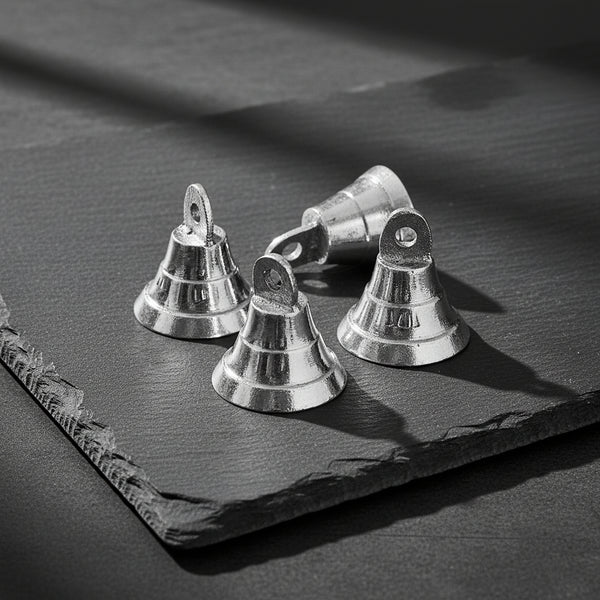 Mini chrome plated brass bell in silver, half inch, for ritual bell ringing, altar use, and energy clearing.