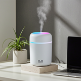 Mini Humidifier USB personal device for adding moisture to dry air in the bedroom, office, room, and car.
