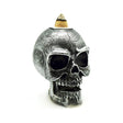 Mini silver skull backflow incense burner for cascading smoke effect, gothic decor, and meditation ambiance.