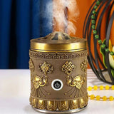 Mini Tibetan USB Electronic Incense Burner with smoke effect for meditation and home ambiance.