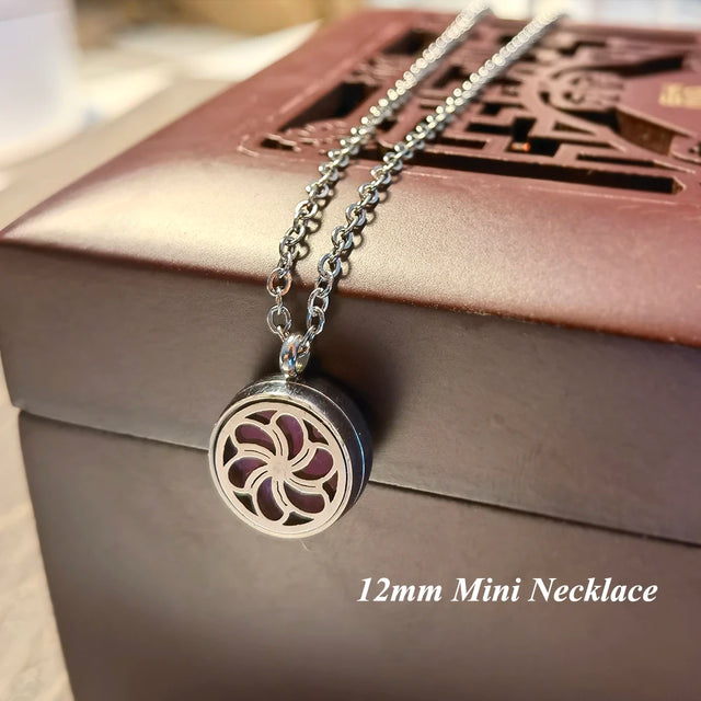 Mini Tree Flower Aromatherapy Locket pendant for holding essential oils and everyday aromatherapy wear.