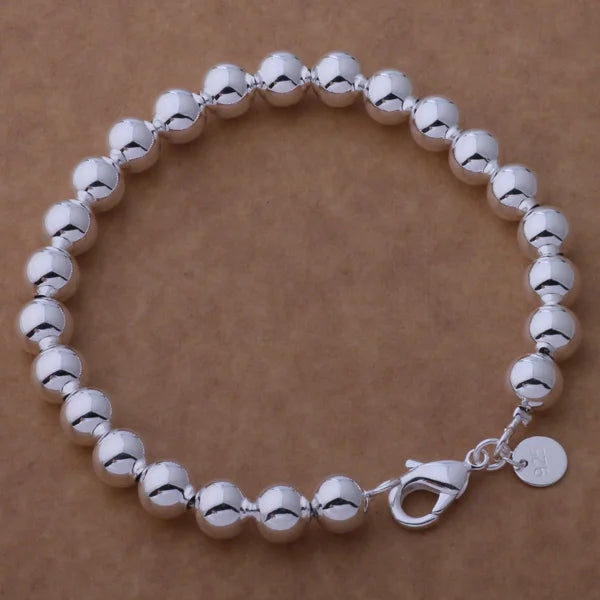 Minimalist 925 Sterling Silver Heart Chain Bracelet silver bracelet for simple everyday styling, stacking, and gift giving.