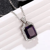 Modern CZ geometry pendant necklace with crystal detail for chic accessorizing, dressy outfits, and contemporary jewelry wear.
