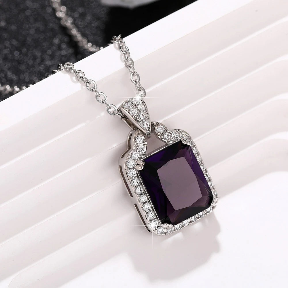 Modern CZ geometry pendant necklace with crystal detail for chic accessorizing, dressy outfits, and contemporary jewelry wear.