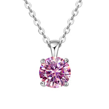Modern moissanite four-prong necklace with pendant for sleek styling, evening outfits, and contemporary jewelry wear.