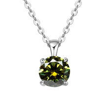 Moissanite pendant necklace with four-prong setting for layering with fine chains, daily accessorizing, and chic styling.