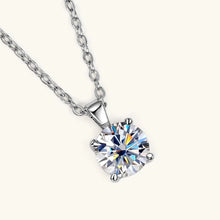Moissanite pendant necklace with four-prong setting for minimalist styling, everyday elegance, and special events.
