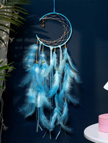 Moon Dream Catcher with feather tassels for window hanging, boho room décor, and peaceful decorative home use.