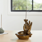 Mudra Hand ceramic backflow incense burner for burning backflow incense cones, meditation, and home relaxation decor.
