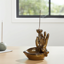 Mudra Hand ceramic backflow incense burner for burning backflow incense cones, meditation, and home relaxation decor.