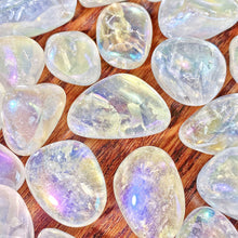Natural Aura Clear Quartz Tumbled Crystals for meditation, crafts, and crystal healing.