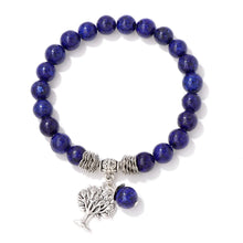 Natural beaded Tree of Life charm bracelet for casual accessory wear, symbolic fashion, and daily outfit styling.