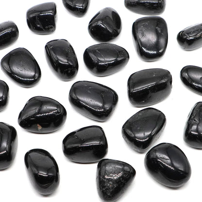 Natural Black Tourmaline Tumbled Stone for meditation, crafts, and crystal healing.