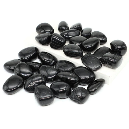 Natural Black Tourmaline Tumbled Stone for meditation, crafts, and crystal healing.