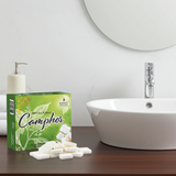 Natural camphor tablets shown from a different angle for aromatic and ceremonial use.