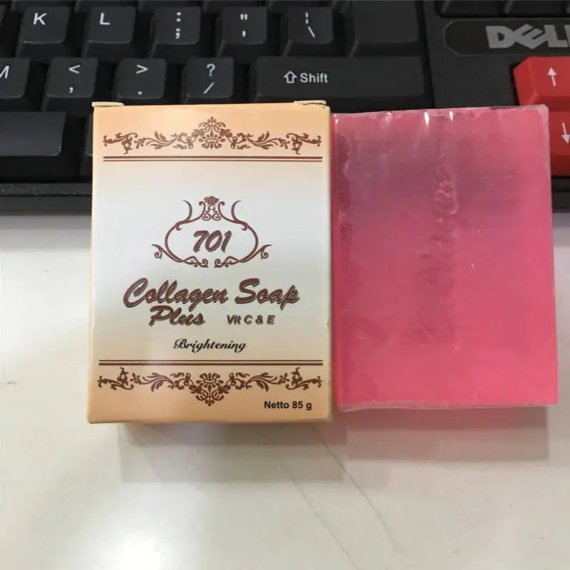 Natural Collagen Handmade Vitamin Soap 85g on desk for daily face and body cleansing routine.