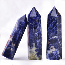 Natural Crystal Point Wand crystal wand for chakra balancing, energy clearing, and holistic healing sessions.