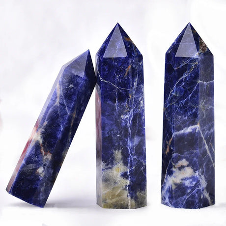 Natural Crystal Point Wand crystal wand for chakra balancing, energy clearing, and holistic healing sessions.