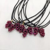 Natural garnet cluster grape necklace with pendant form for elegant layering, occasion wear, and fashion accessory use.