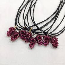 Natural garnet cluster grape necklace with pendant form for elegant layering, occasion wear, and fashion accessory use.