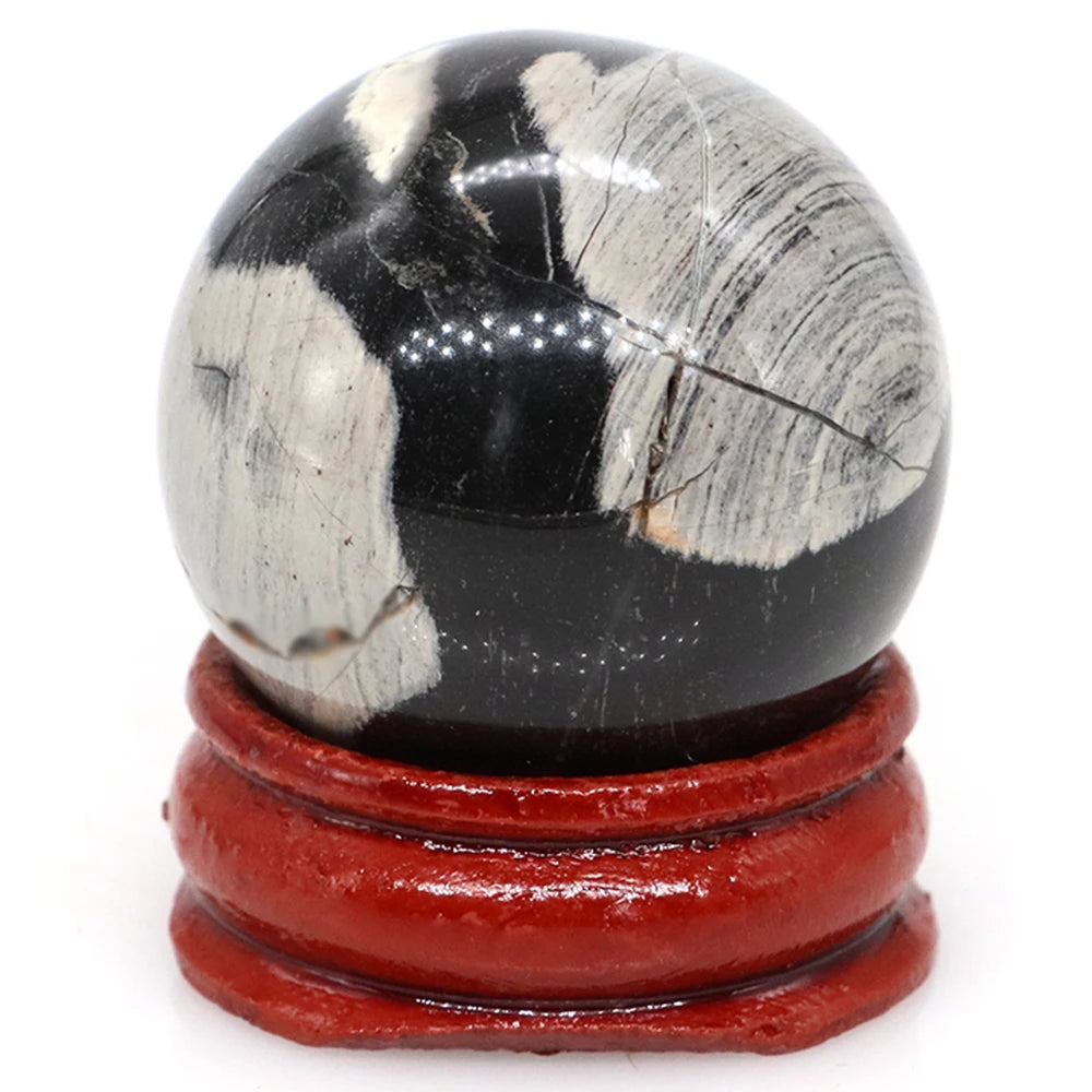 Natural gemstone chakra ball sphere for energy healing, meditation practice, and spiritual décor use.