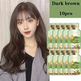 Natural Herbal Hair Dye Shampoo in dark brown — woman with hair and 10-pack product packaging.