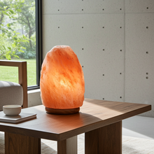 Natural Himalayan Salt Lamp with wood base for warm ambient lighting, home styling, and restful spaces.