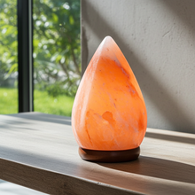 Natural Himalayan Salt Lamp authentic pink crystal with wood base for warm ambient lighting, relaxation, and calming home décor.