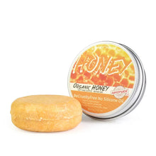 Natural Honey Essence Shampoo Bar close-up showing bar texture and natural honey formula.
