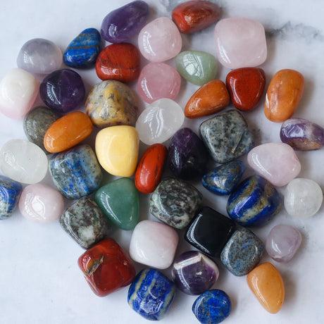 Natural Jade Mix Tumbled Stones for meditation, crafts, and crystal healing.