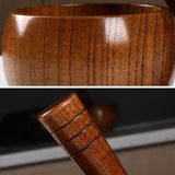 Natural jujube wood mortar and pestle set for crushing peppercorns, garlic, and fresh herbs for meal prep.